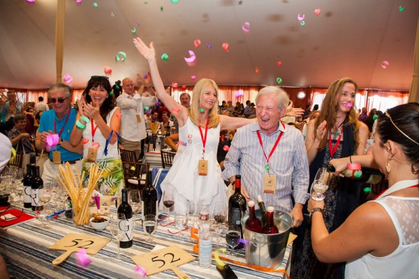 Celebrating the winning bid of lot number 1 at Auciton Napa Valley 2014. Photo by Jason Tinacci for the Napa Valley Vintners.
